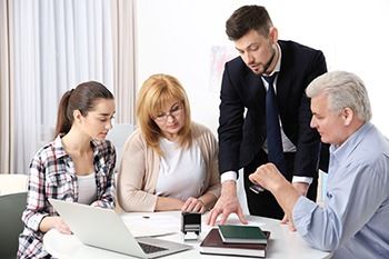 Four people discussing